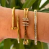 Brazalete dorado rígido Nicole