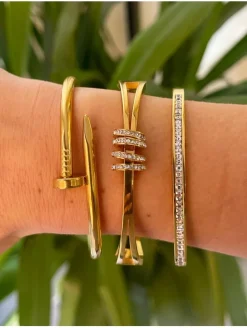 Brazalete dorado rígido Nicole
