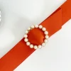 Cinturón liso NARANJA hebilla redonda perlas