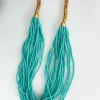 Collar mitad dorado y aguamarina mini abalorios Sea