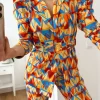 Conjunto traje pantalón estampado geometrico naranja y azul  (M18)
