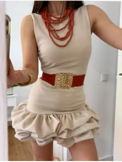 Vestido beige bajo abullonado culotte