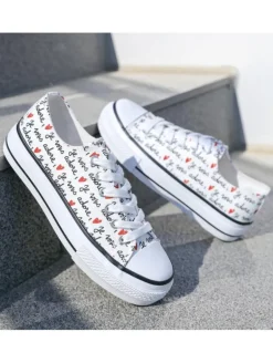 Zapatillas blancas letras (MKL)